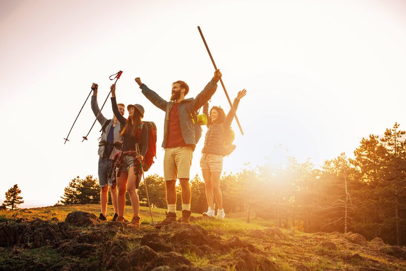 Hikers celebrating a summit
